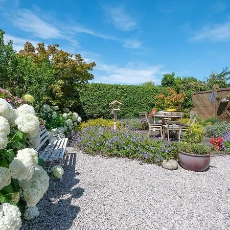 Holiday home Charming House With Garden De Haan